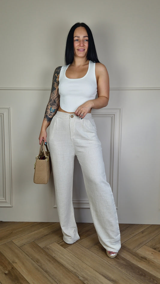 Crafted for the modern woman, our MELISSA linen trousers offer a perfect blend of style & comfort. Made from a lightweight combination of cotton & linen & elasticated waist these stunning trousers are perfect for any occasion. Enjoy the breezy & breathable fabric while looking effortlessly chic.